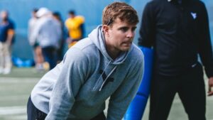 WVU QB coach Tyler Allen's coaching career nearly ended before it even started